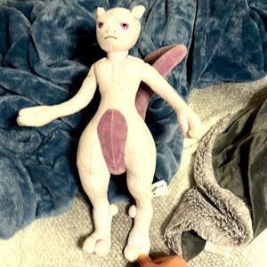 Mewtwo plush toy.